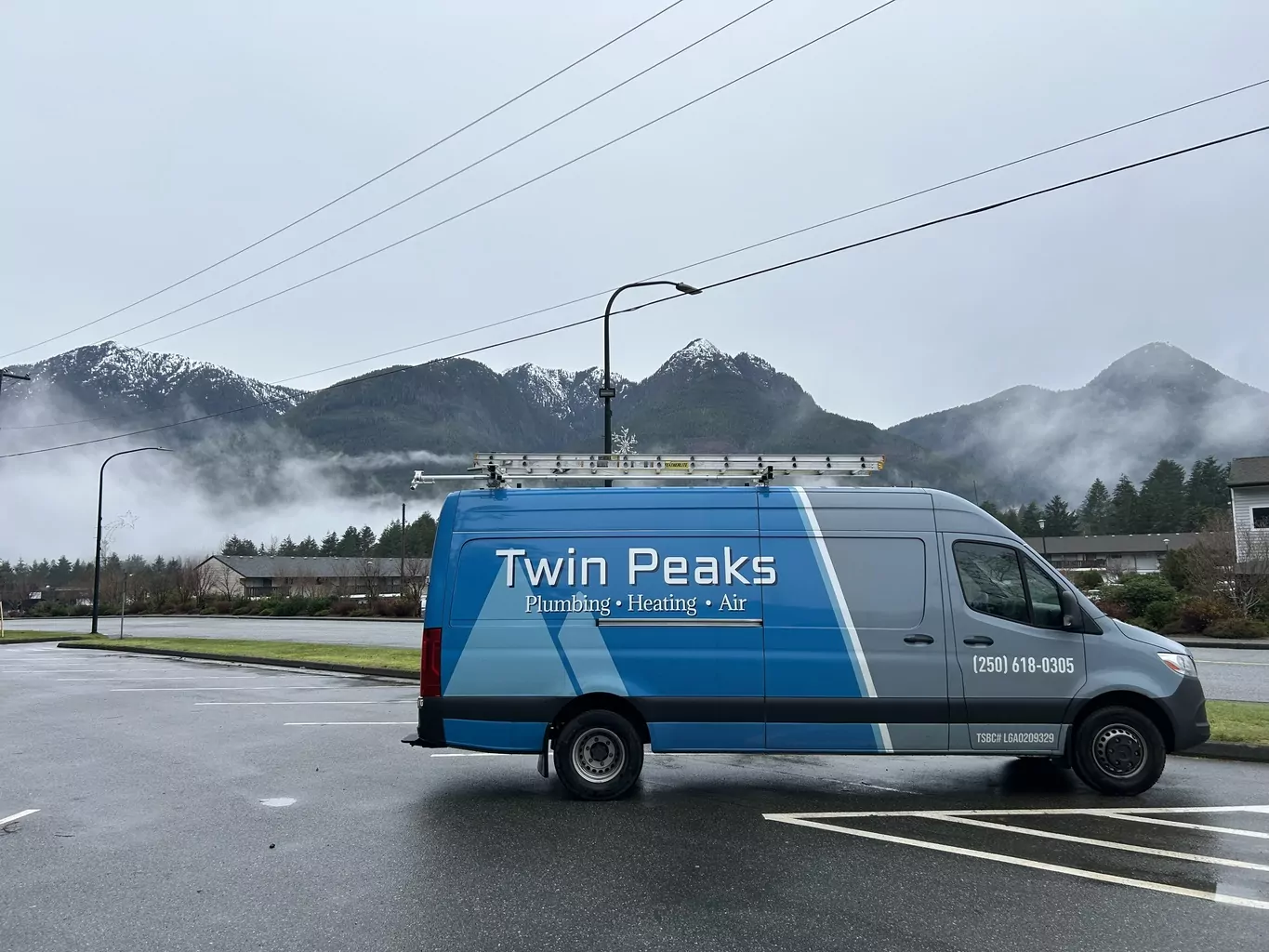 twin peaks van with a beautiful landscape in the background